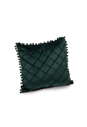 The Intima Hogar Cojin Velvet Verde is a dark green throw pillow featuring a quilted diamond pattern and small pom-pom trim along the edges, shown against a white background.