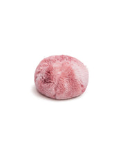 The Cojín de Lujo Flamenco Ball by Intima Hogar is a round, fluffy pet bed crafted from soft, shaggy pink fabric, shown on a plain white background.