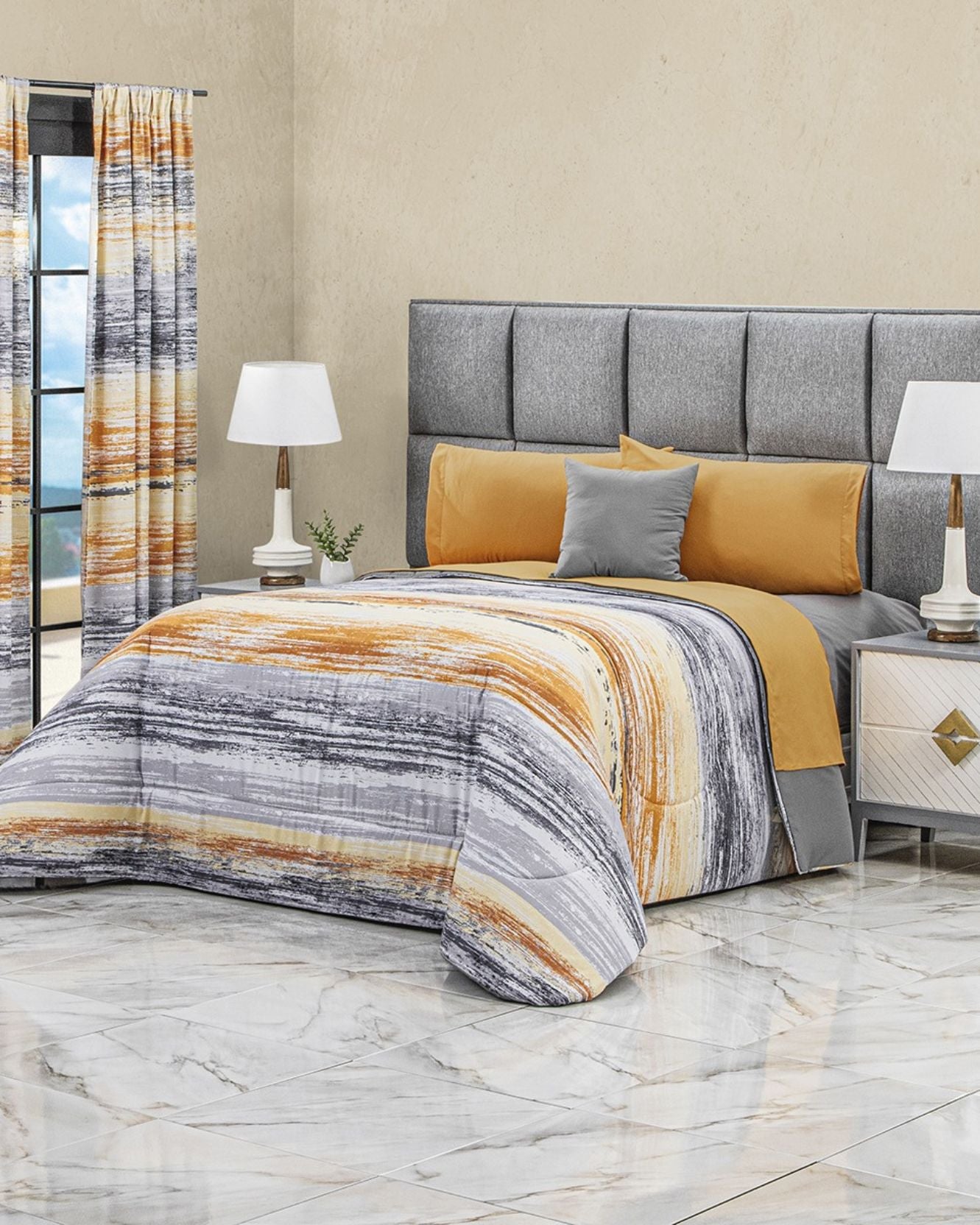 A modern bedroom featuring the Intima Hogar Coordinado de Edredón Super Suave Axel in striped yellow, gray, and white, with a gray headboard, matching cushion and curtains, two white lamps on nightstands, marble floors, and beige walls.