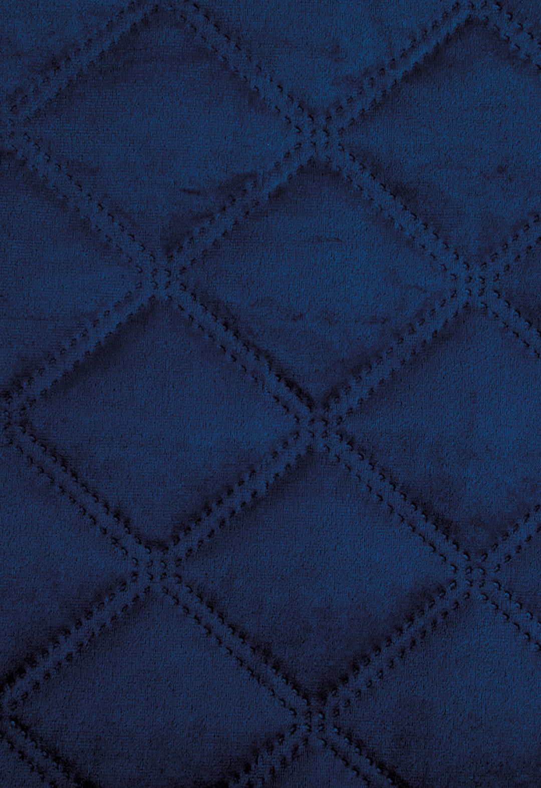 Close-up of the Intima Hogar Juego de Cobertor Velvet Lovett Azul, featuring a soft, velvety texture and a quilted diamond pattern with raised stitching.