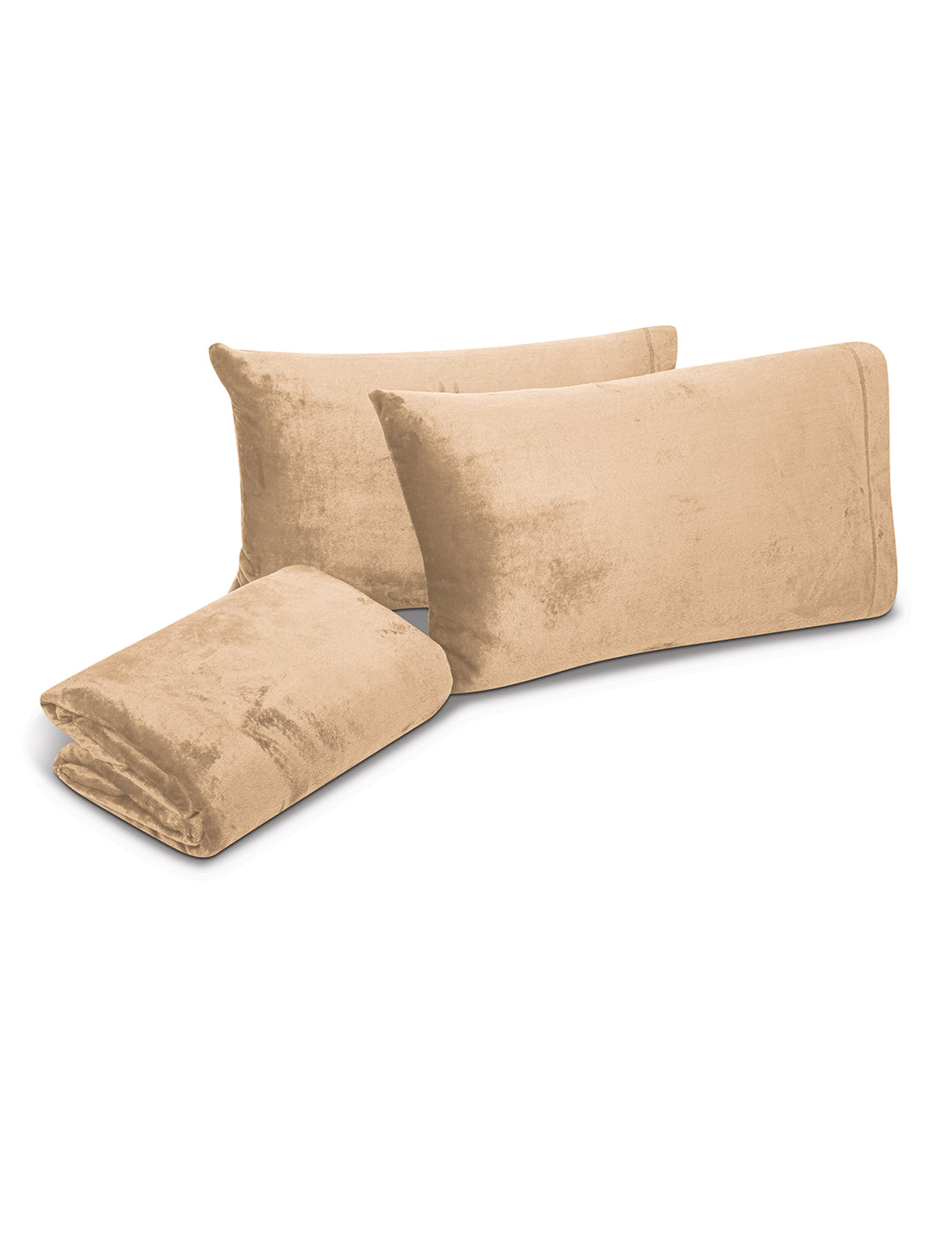 Three beige velvet pillow covers are displayed—two upright and one folded—on a white background, ideal for pairing with the Juego de Sábanas Invernales Camel by Intima Hogar to add a cozy and elegant touch to your bedroom.
