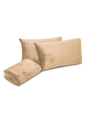 Three beige velvet pillow covers are displayed—two upright and one folded—on a white background, ideal for pairing with the Juego de Sábanas Invernales Camel by Intima Hogar to add a cozy and elegant touch to your bedroom.